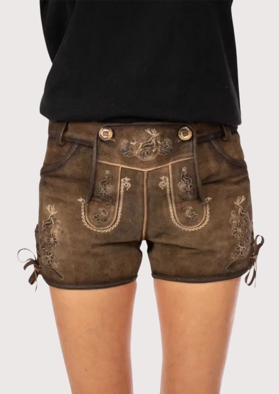 Premium women’s lederhosen with floral embroidery and high-quality leather, perfect for Oktoberfest and cultural events.
