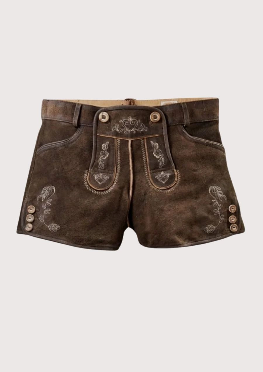 Elegant leather lederhosen for women, perfect for Oktoberfest and cultural events with intricate floral embroidery and adjustable button fit.