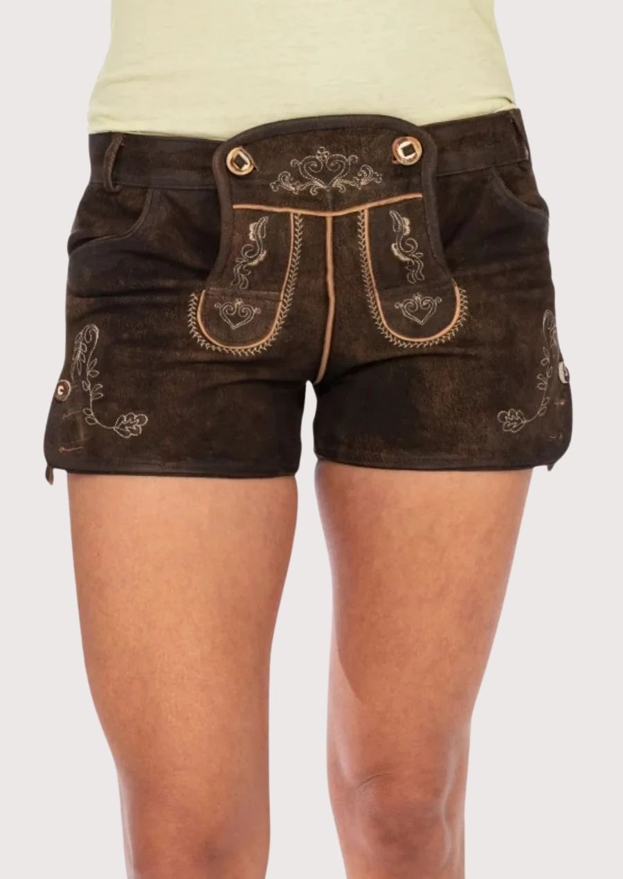 Elegant leather lederhosen for women, perfect for Oktoberfest and cultural events with intricate floral embroidery and adjustable button fit.