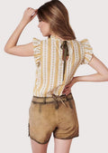 Artisan floral women's lederhosen style showcasing embroidered blooms, premium suede construction, and Alpine elegance.