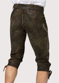 Artisan suede Bundhosen showcasing weathered leather, traditional tailoring, and authentic Bavarian heritage