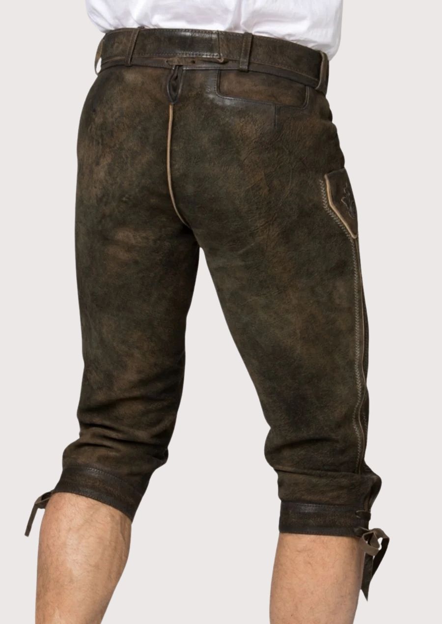 Artisan suede Bundhosen showcasing weathered leather, traditional tailoring, and authentic Bavarian heritage