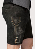 Charcoal goatskin lederhosen showcasing understated embroidery and timeless German craftsmanship
