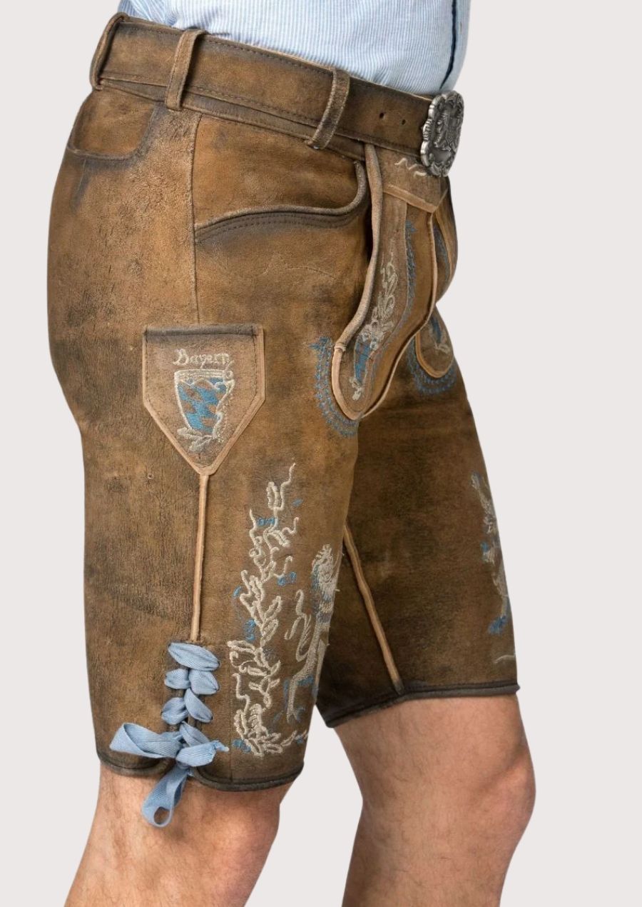 Rustic brown suede lederhosen showcasing blue-and-white embroidery and heritage German styling