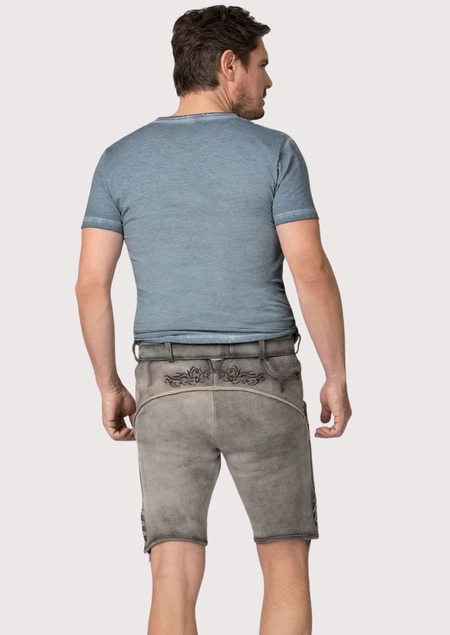 Stone gray goatskin lederhosen featuring intricate black embroidery and classic German craftsmanship