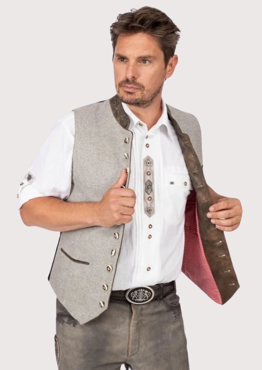 Men's traditional Bavarian vest with green embroidery and wooden button details, perfect for festive events and cultural occasions.


