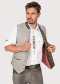 Men's traditional Bavarian vest with green embroidery and wooden button details, perfect for festive events and cultural occasions.


