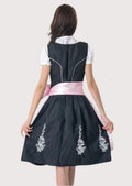 Authentic Alpine Dirndl dress with white floral embroidery, blush pink ribbon apron, fitted bodice, and traditional Bavarian styling.