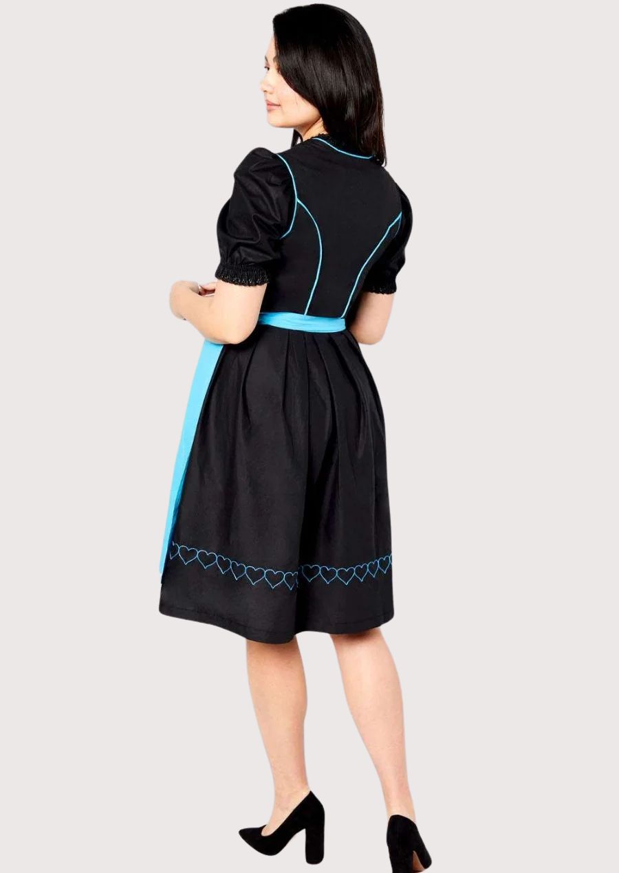 Authentic German Dirndl featuring a fitted black bodice, embroidered chest panel, blue waist apron, and timeless Alpine elegance.