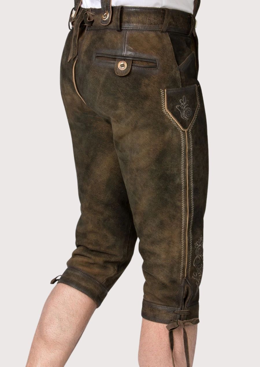Authentic German Bundhosen for Oktoberfest wear featuring rustic brown leather and traditional embroidered accents