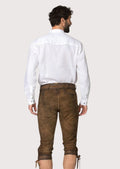 Authentic German leather knee breeches made from goatskin suede with rustic brown texture and traditional craftsmanship