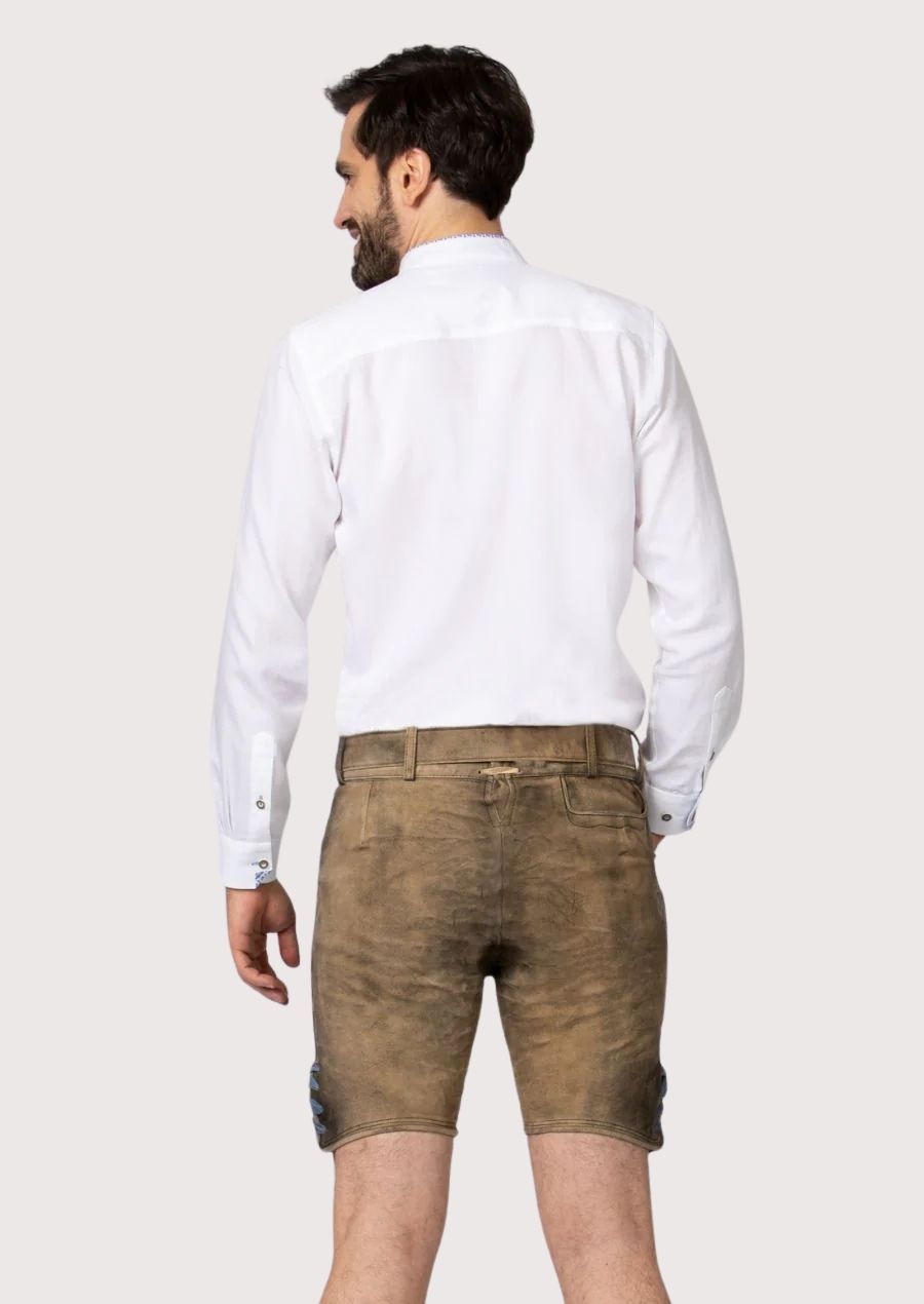 Authentic German lederhosen shorts with heritage-inspired embroidery and decorative belt buckle