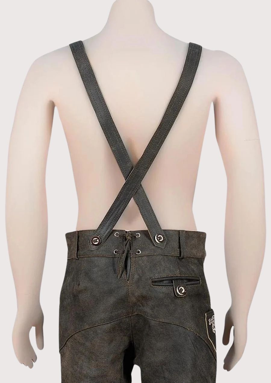 Traditional black Bavarian lederhosen set with decorative suspenders, embroidery, and Oktoberfest appeal