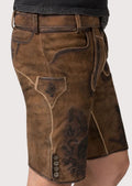 Premium brown suede lederhosen combined with a skull graphic t-shirt for modern Oktoberfest styling