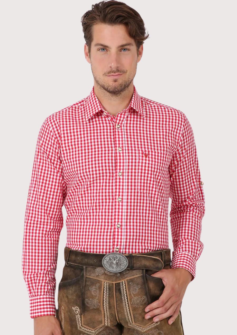 Man wearing red checkered Bavarian Trachten shirt and traditional leather lederhosen

