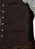 Close-up of authentic alpine vest in brown wool, perfect for festive occasions

