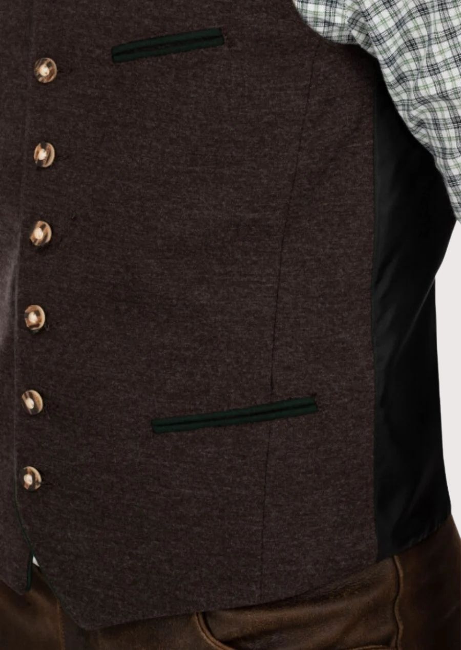 Close-up of authentic alpine vest in brown wool, perfect for festive occasions

