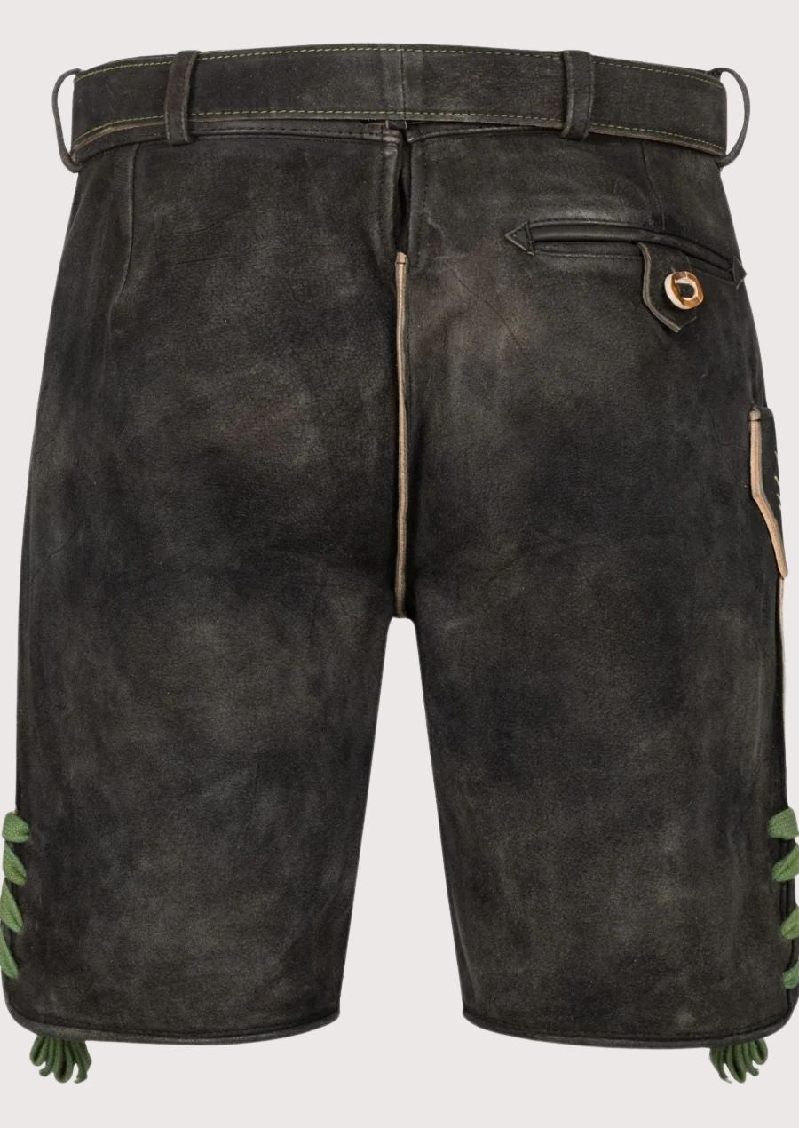 Authentic black suede lederhosen showcasing green floral embroidery and heritage German design