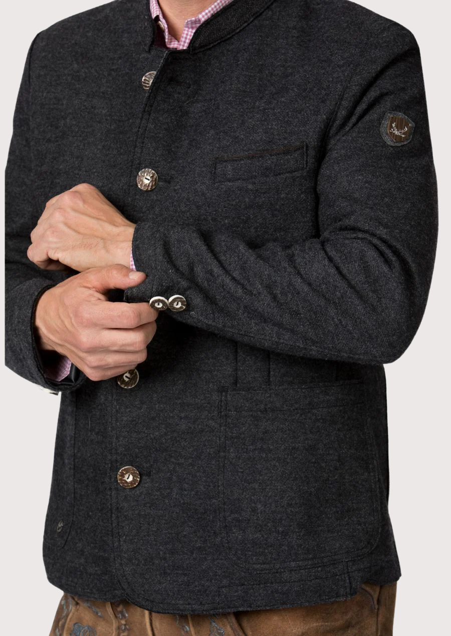 Man wearing a charcoal Bavarian Trachten jacket with horn-style buttons