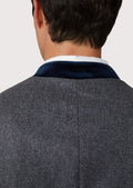 Elegant grey Bavarian wool vest with wooden button accents and a modern silhouette, ideal for festive occasions and cultural events.