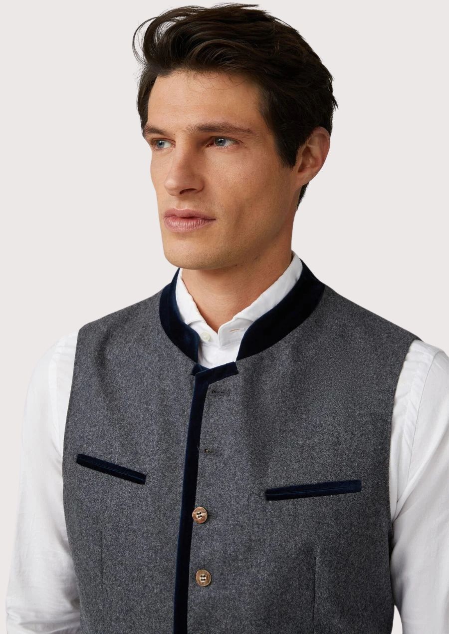 Stylish Bavarian wool vest in grey with green accents and embroidered details, ideal for Oktoberfest and folk festivals.