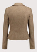 Beige women’s alpine blazer with fitted waist and decorative metal buttons.