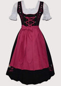 Rose pink and black embroidered Dirndl dress for women with pink apron, lace-up corset bodice, white puff sleeve blouse, traditional Bavarian Oktoberfest outfit, authentic German Alpine clothing.
