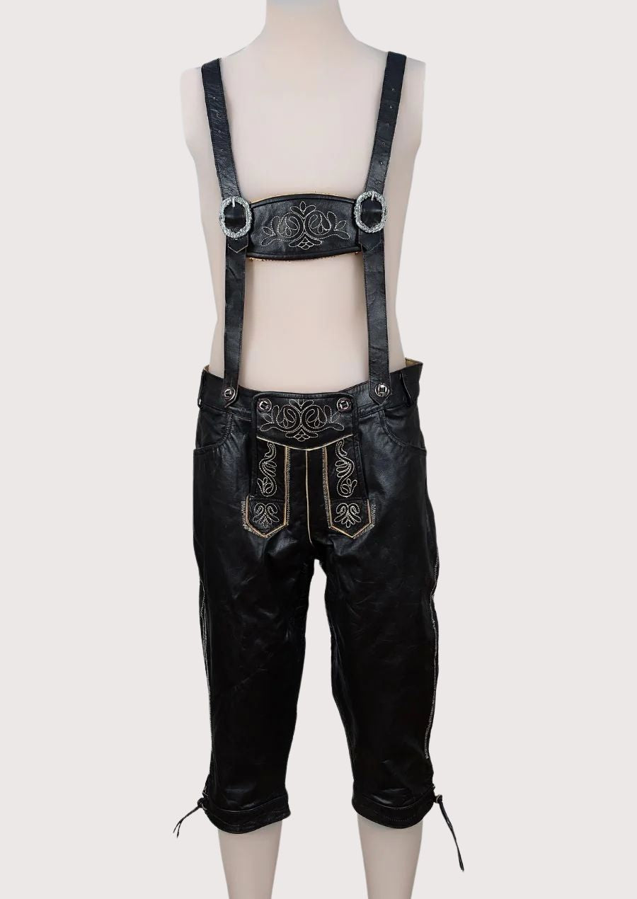 Men's Black Bundhosen Alpine Scrollwork with suspenders, embroidered front flap, traditional Bavarian craftsmanship, Alpine heritage design, and Oktoberfest styling