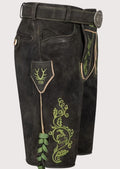 Men's black goatskin suede lederhosen featuring vibrant green embroidery and authentic Bavarian craftsmanship