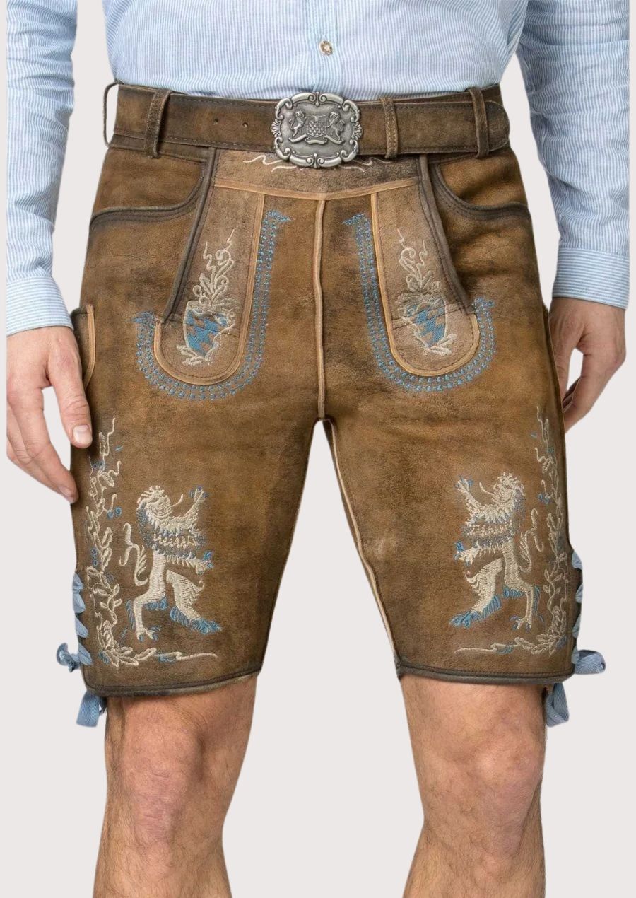 blue crest bavarian lederhosen featuring Bavarian-inspired embroidery, lion artwork and traditional design