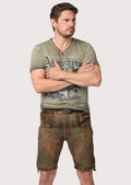 Distressed brown goatskin suede lederhosen featuring olive-green embroidery and traditional Bavarian styling