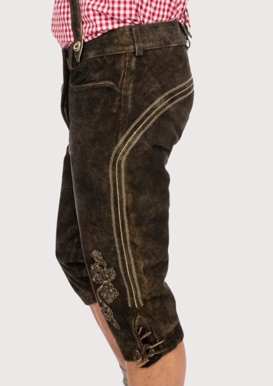 Premium suede leather Bundhosen for men, featuring metal buckle suspenders and floral embroidery, perfect for beer festivals, Oktoberfest, and traditional events.