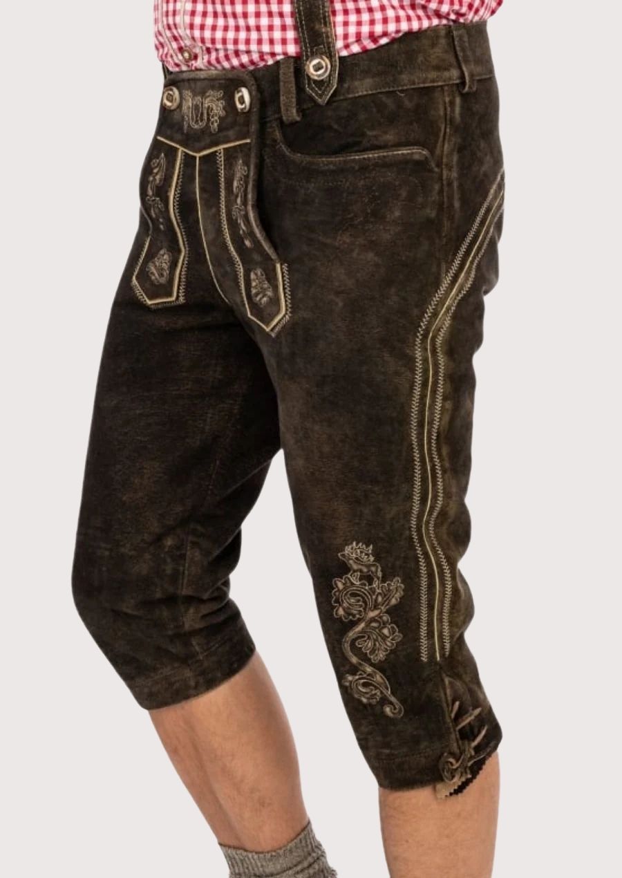 Authentic Bavarian Bundhosen for men, featuring floral embroidery, suede leather, and adjustable suspenders, ideal for Oktoberfest and beer festivals.