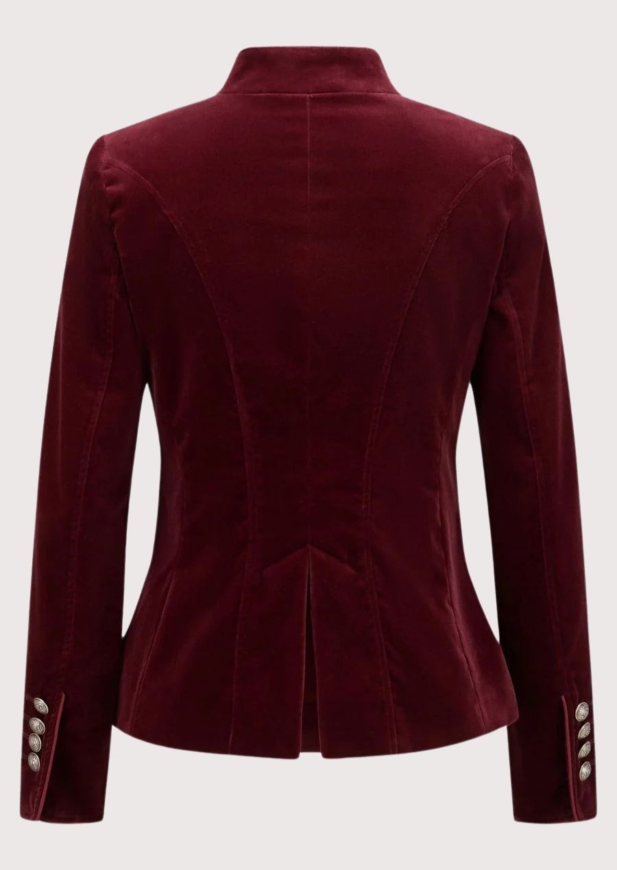 Burgundy women’s trachten jacket with velvet texture and decorative silver buttons.