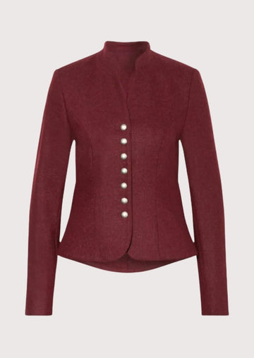 Burgundy women’s trachten jacket with fitted shape, stand collar, and traditional alpine buttons.
