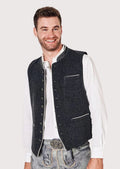 Man wearing charcoal Bavarian vest with traditional embroidery