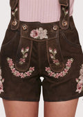 Stylish women’s lederhosen with hand-stitched embroidery, ideal for festive occasions and cultural celebrations.