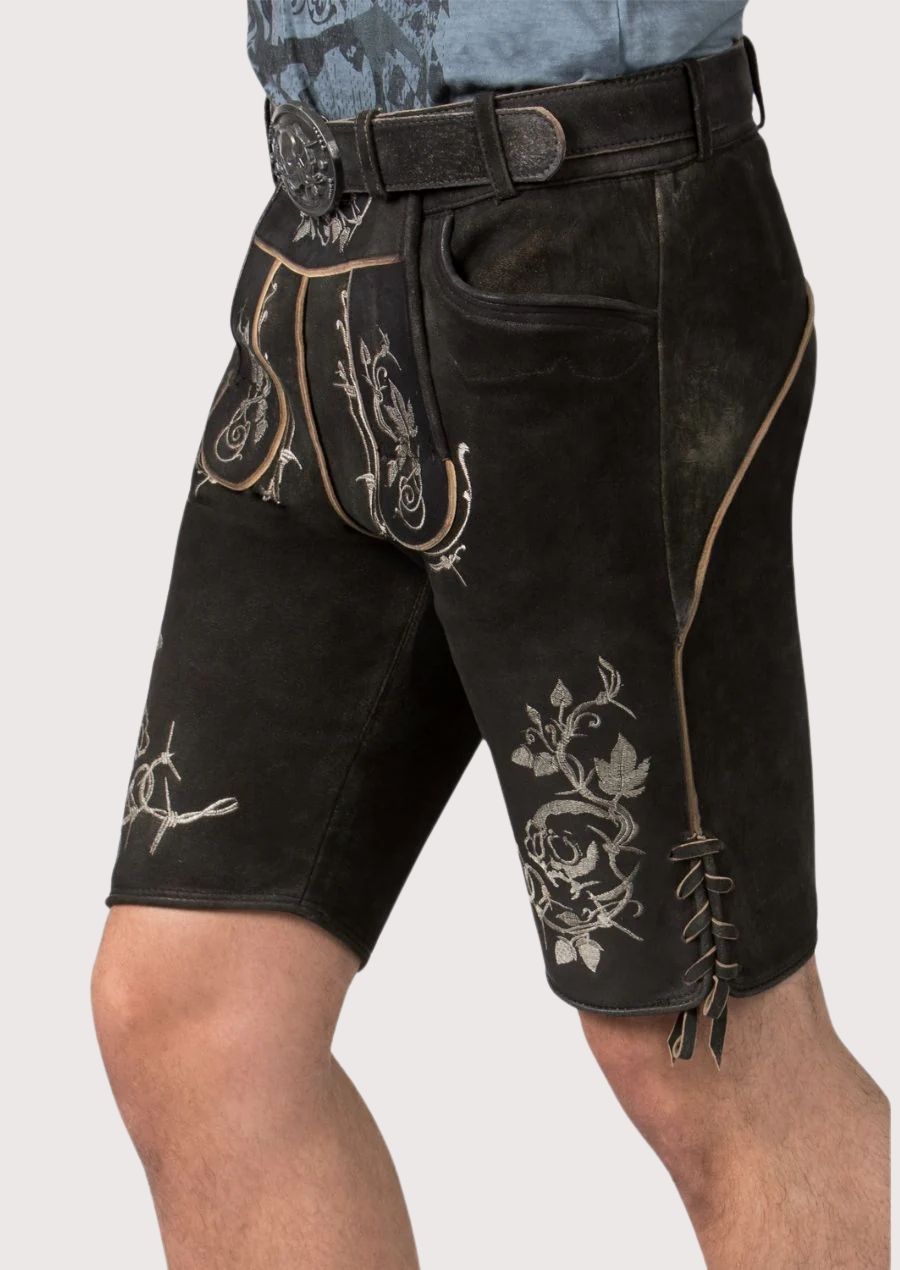 Traditional black lederhosen shorts with gothic embroidery, skull details and premium suede construction