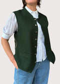 Classic women’s sleeveless green waistcoat with metal buttons.