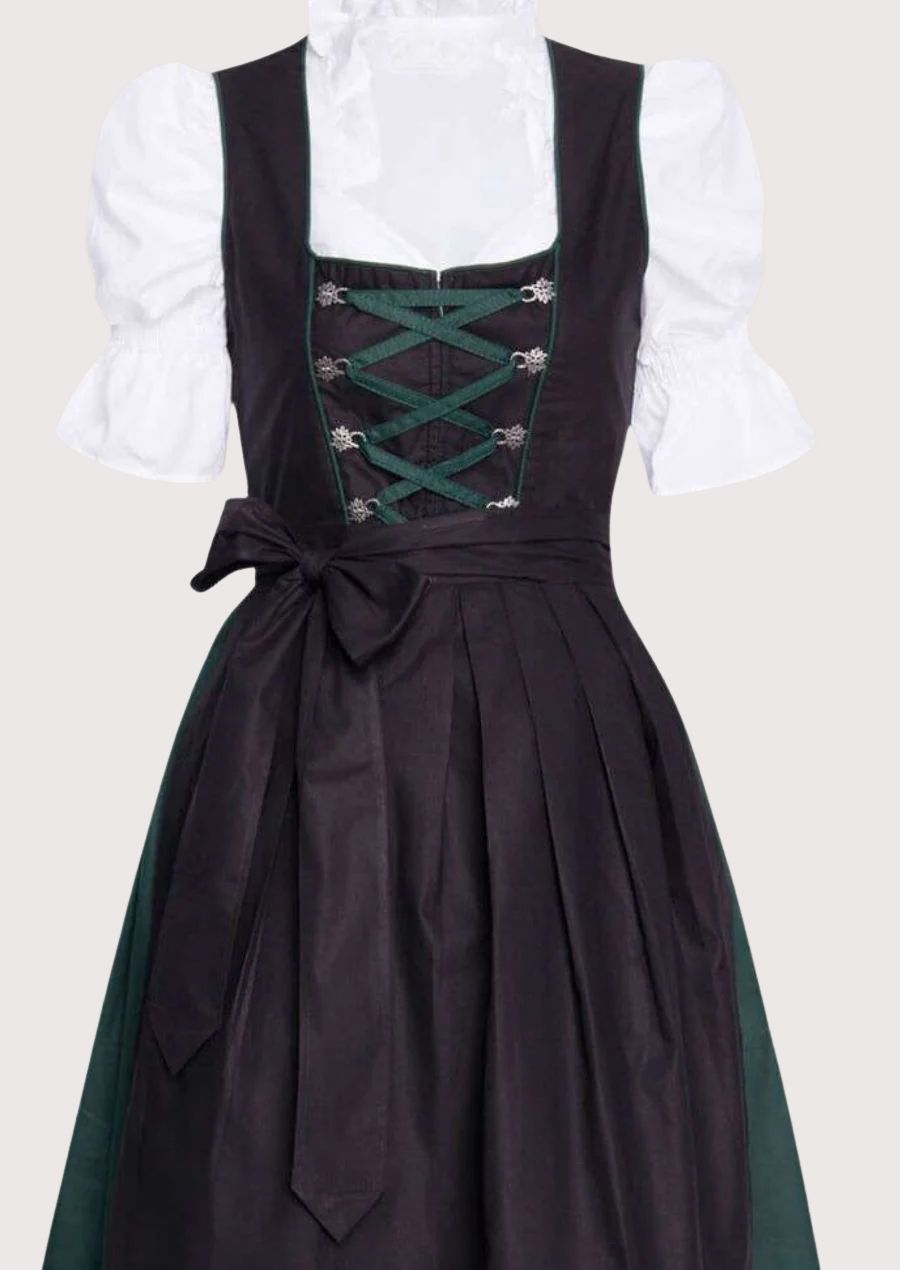 Classic folk dirndl green trim with black apron, lace-up corset bodice, white puff sleeve blouse, traditional Bavarian Oktoberfest outfit, authentic German Alpine clothing.