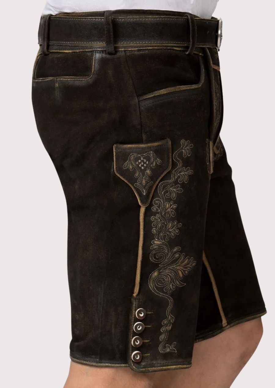 Men's dark leather lederhosen featuring ornate embroidery, side buttons, and timeless Bavarian appeal