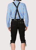 Classic Oktoberfest black lederhosen trousers paired with suspenders and intricate traditional embroidery