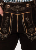 Classic Oktoberfest lederhosen long pants featuring embroidered front flap, leather braces, and rustic brown finish