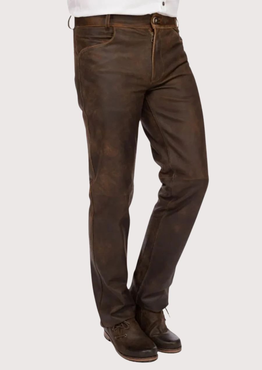 Dark brown leather Trachten pants for men featuring a slim fit silhouette, premium craftsmanship, and traditional Bavarian styling