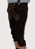 Dark brown goatskin suede lederhosen pants with suspenders, decorative embroidery, and traditional Bavarian styling