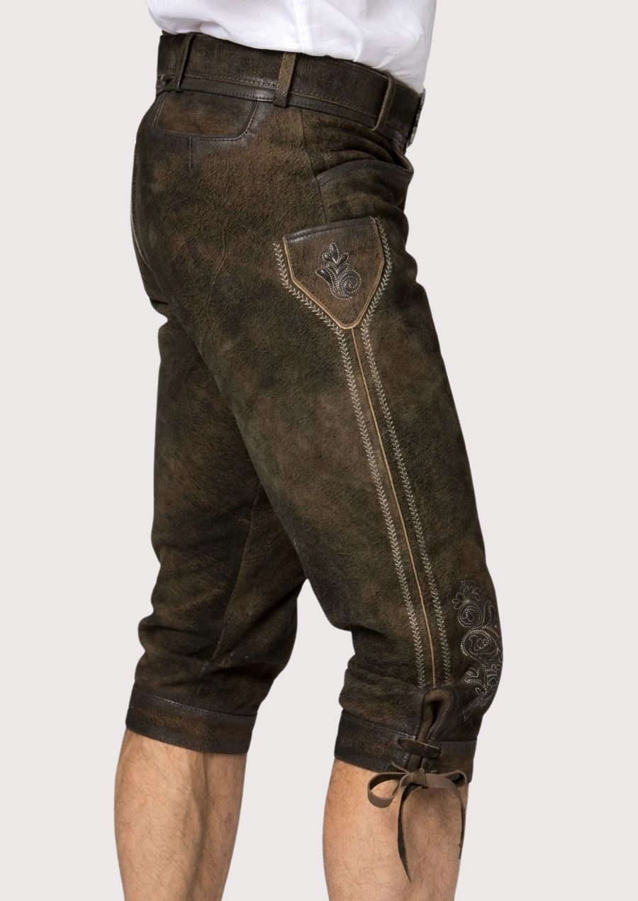 Dark heritage Bundhosen crafted from premium suede leather with a vintage brown appearance and Alpine character