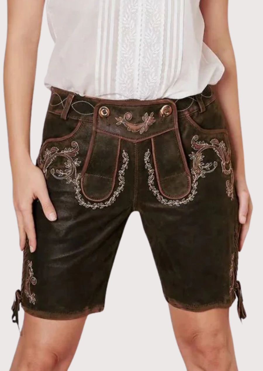 Dark Suede Lederhosen Floral Vine in dark brown leather with decorative motifs and traditional Bavarian aesthetics.
