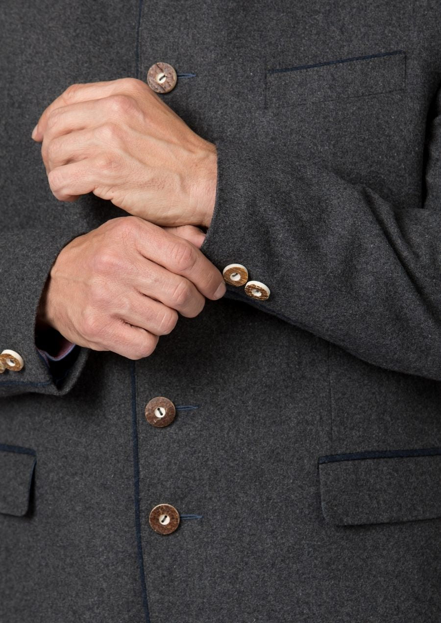 Elegant alpine grey jacket featuring a structured stand collar.