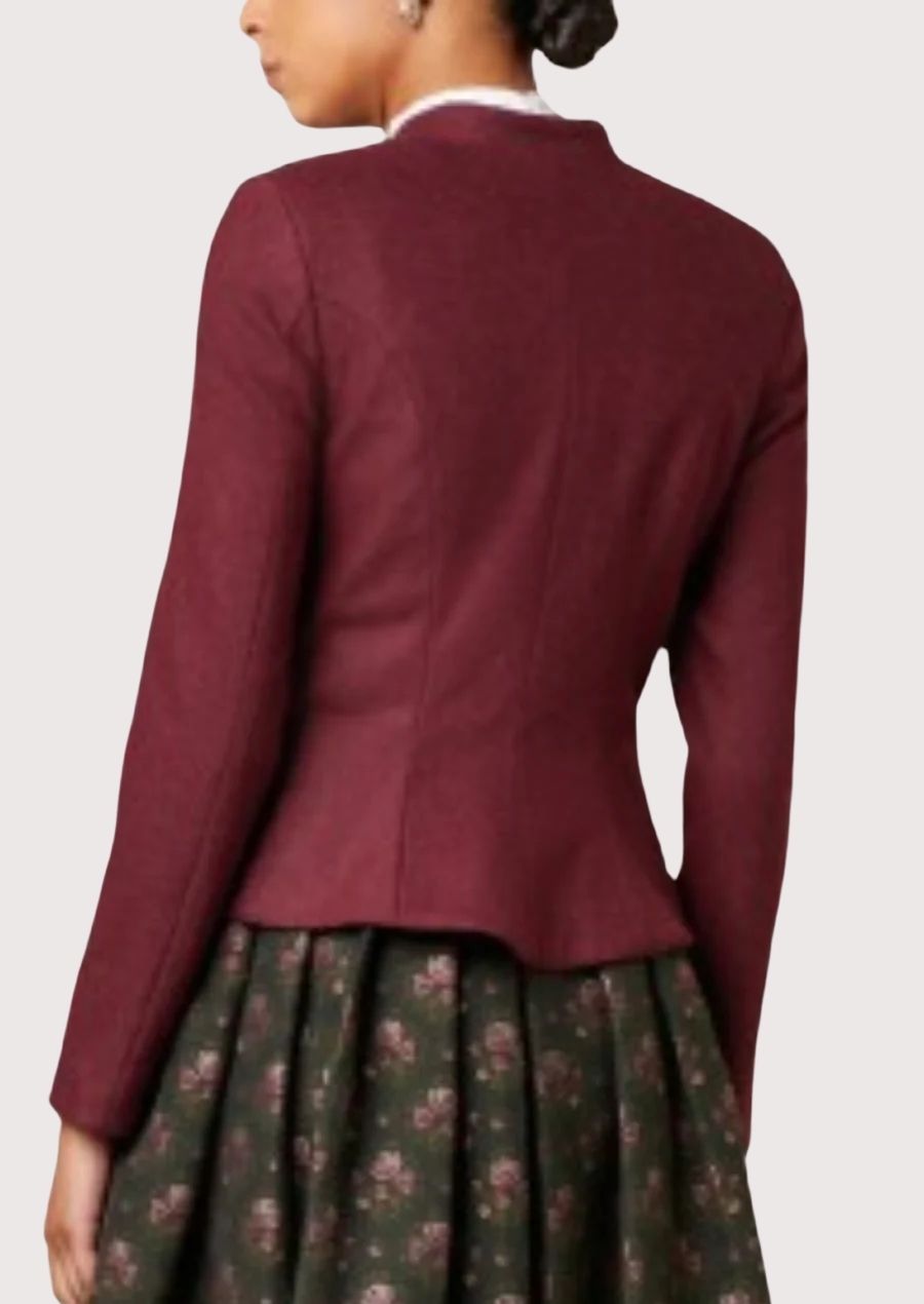 Elegant burgundy alpine jacket for women with long sleeves and traditional German styling.
