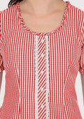 Stylish women's gingham blouse with puffed sleeves and lace trim, perfect festival wear.